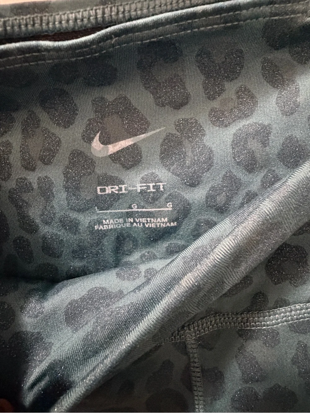 Women’s Teal Nike Leopard Print Leggings